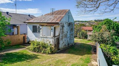 Historic Warrawong 'half house' set for auction in Wollongong as theories abound