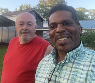 Neighbour of Black pastor arrested for watering flowers speaks out: ‘He’s a good guy’