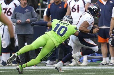 Seahawks EDGE Uchenna Nwosu chases down Russell Wilson for a sack