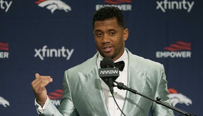 Did Russell Wilson almost accidentally end his postgame interview with ‘Go Hawks’?