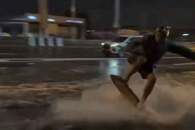 British-Thai wakeboarder charged after doing stunts on flooded highway