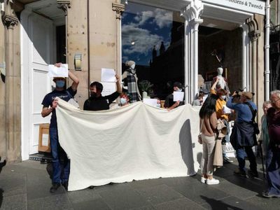 Protest outside St Giles' Cathedral as Queen lies in state
