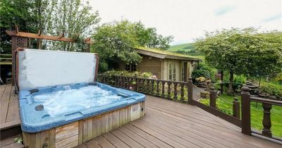 Breathtaking Edinburgh Pentlands cottage hits market with insane views and hot tub