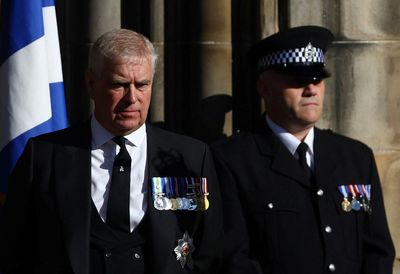 Scottish police charge man who heckled Prince Andrew during procession
