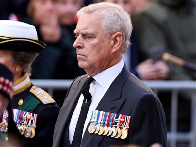 Prince Andrew’s fall from grace as Queen’s ‘favourite’ son heckled in street by her coffin