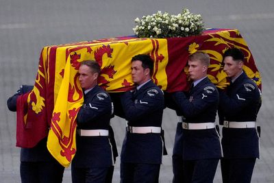 Plane carrying coffin of Queen Elizabeth lands in London