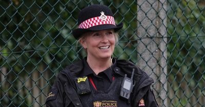 Penny Lancaster assists public in police uniform at RAF Northolt as Queen arrives