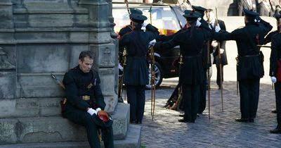 Edinburgh Royal Archer faints while standing in sun as Queen's coffin leaves city