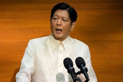 Philippine leader says calling his father dictator `wrong'