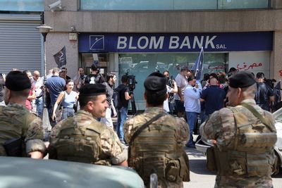 Depositors hold up two Lebanese banks to grab their own money