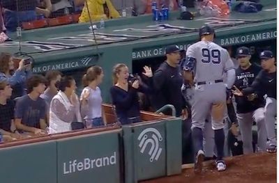 A MLB fan had a priceless reaction to getting a high-five from Aaron Judge after his 57th home run