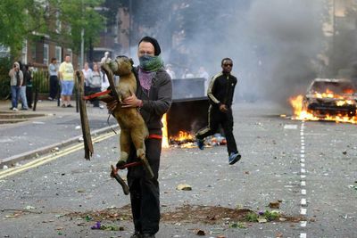 A rioter with a rocking horse – Max Reeves’s best photograph