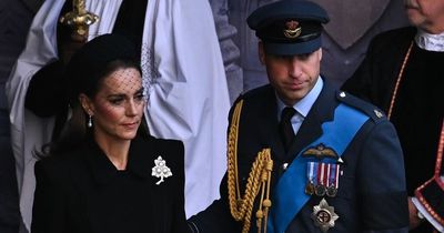 Kate wears Queen's brooch and Diana's earrings at lying in state service