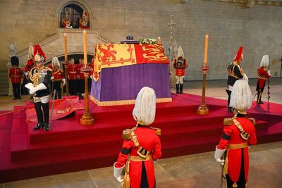 The King and his sons walk behind Queen’s coffin ahead of lying in state