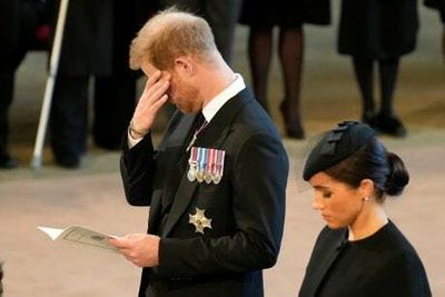Emotional Prince Harry sheds a tear for the Queen as he stands near coffin