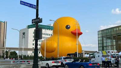 Dinosaurs, World's Largest Rubber Duck Part Of New Detroit Auto Show