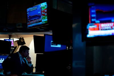 Asian shares mixed after wobbly gains on Wall St