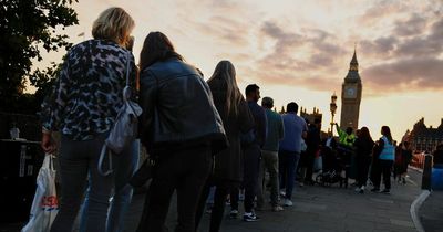 Thousands stand for hours to see Queen Elizabeth lying in state as queue nears three-miles long