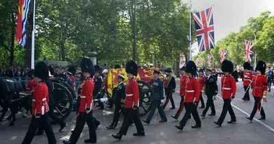 'Disrespectful' gesture during Queen's procession leaves Royal fans fuming