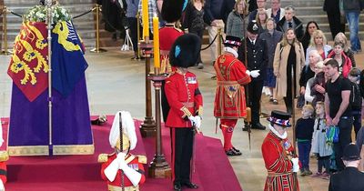 Tears, tiara and Union flags - mourners of all ages unite in grief for Queen they loved