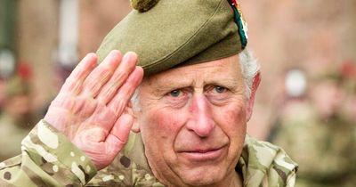 Prince Charles presents medals to Scottish soldiers during visit to Fort George
