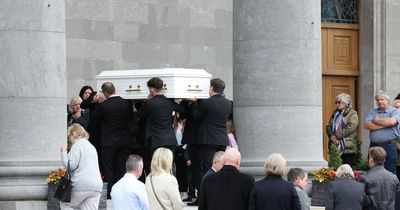 'Inseparable' siblings killed in Westmeath car fire buried in double white coffin as funeral hears they're 'now exploring heaven together'