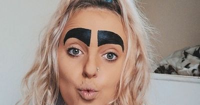 Woman with 'Britain’s biggest eyebrows' taunts trolls who said she'd never find love