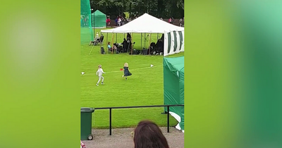 Crowds cheer as adorable girl forgets to stop at Highland Games race finish line