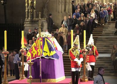 Silent crowds file past the coffin of the only British monarch most have known