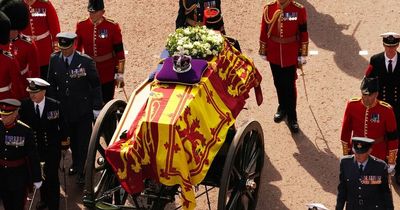 Woman begins queuing outside Westminster Abbey FOUR days before Queen's funeral