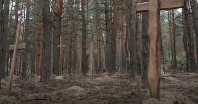 'Horrific mass grave with 440 dead' found in city liberated by Ukrainian forces