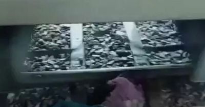 Boy loses fingers after slipping through gap before train drives over him