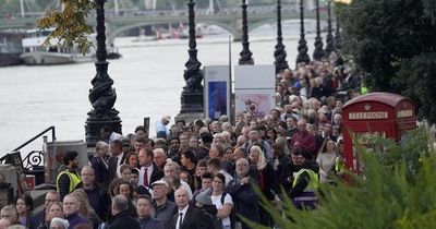 Mourners in 'the queue' to see the Queen's coffin face getting wet as showers forecast