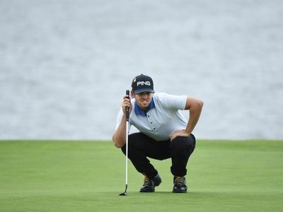 Lower sets blistering pace for PGA lead