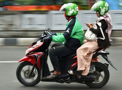 Indonesian gig drivers fear hardship after fuel price hike
