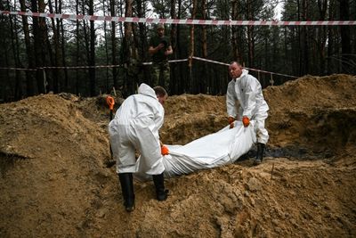 Ukraine says graves and 'torture centres' found in recaptured east