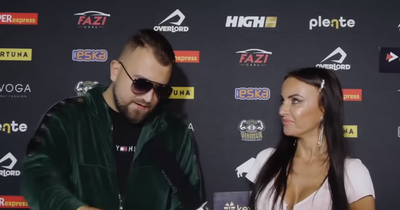 MMA fighter Amadeusz Roslik sucker-punches YouTube star Sadek during television interview