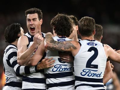 Cats smash Lions to book grand final berth