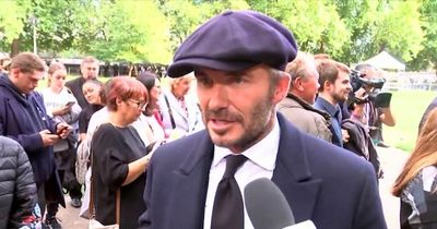 David Beckham dons flat cap and suit as he joins thousands in queue for Queen lying in state