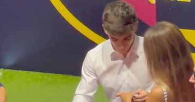 Barcelona star Gavi lands female fan's 'phone number' during shirt signing