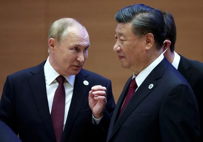 Putin says summit meeting with Xi was "normal"