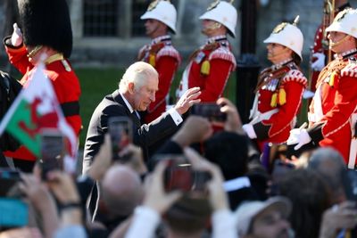 King Charles feted in Wales as queue wait to see late queen hits 24 hours