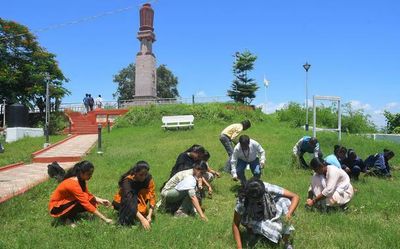 Youth volunteers clean up Gandhi Hill