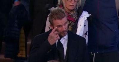 David Beckham wipes away tears as he pays respects to Queen after 13-hour queue