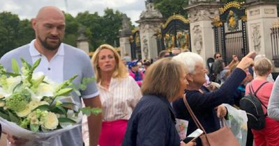 Tyson Fury pays touching tribute to The Queen alongside wife Paris at Buckingham Palace