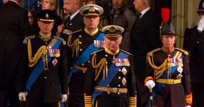 Andrew in military uniform for vigil around Queen's coffin watched by senior royals