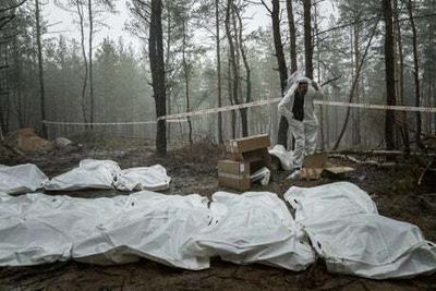 ‘How many more have to die?’ Zelensky brands Russia terrorist nation after mass exhumations at Izyum