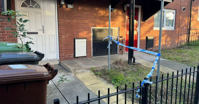 Woman and child found dead inside flat