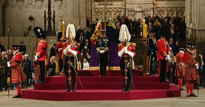 Man who rushes at Queen's coffin tackled to the ground by police and security guards