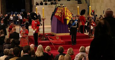 Man who rushes at Queen's coffin wrestled to the ground by police and security guards